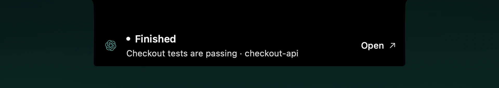 A completed task appears in the Mac notch